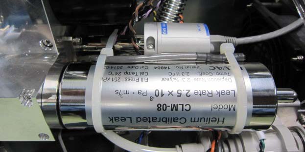 ULVAC CLM-08 helium calibrated leak — internal reference standard with certified leak rate label